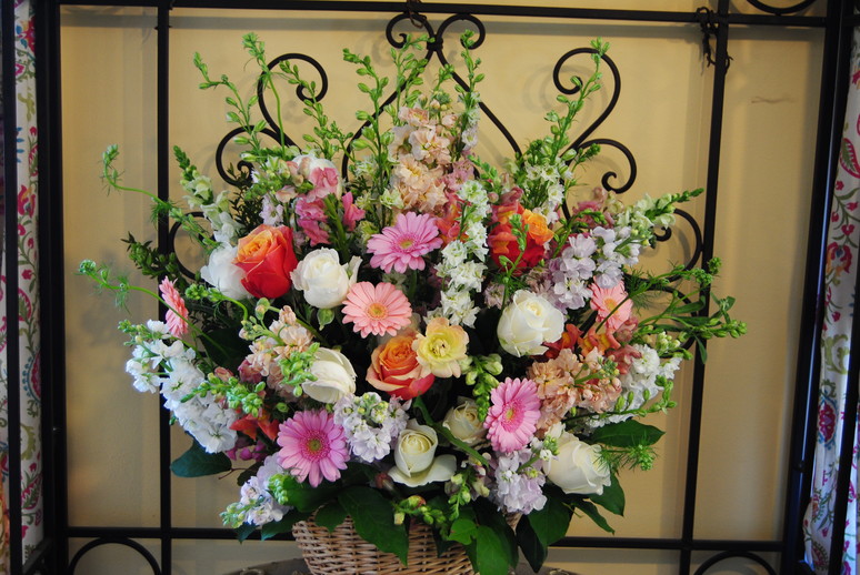 A custom gift arrangement of mixed seasonal flowers
